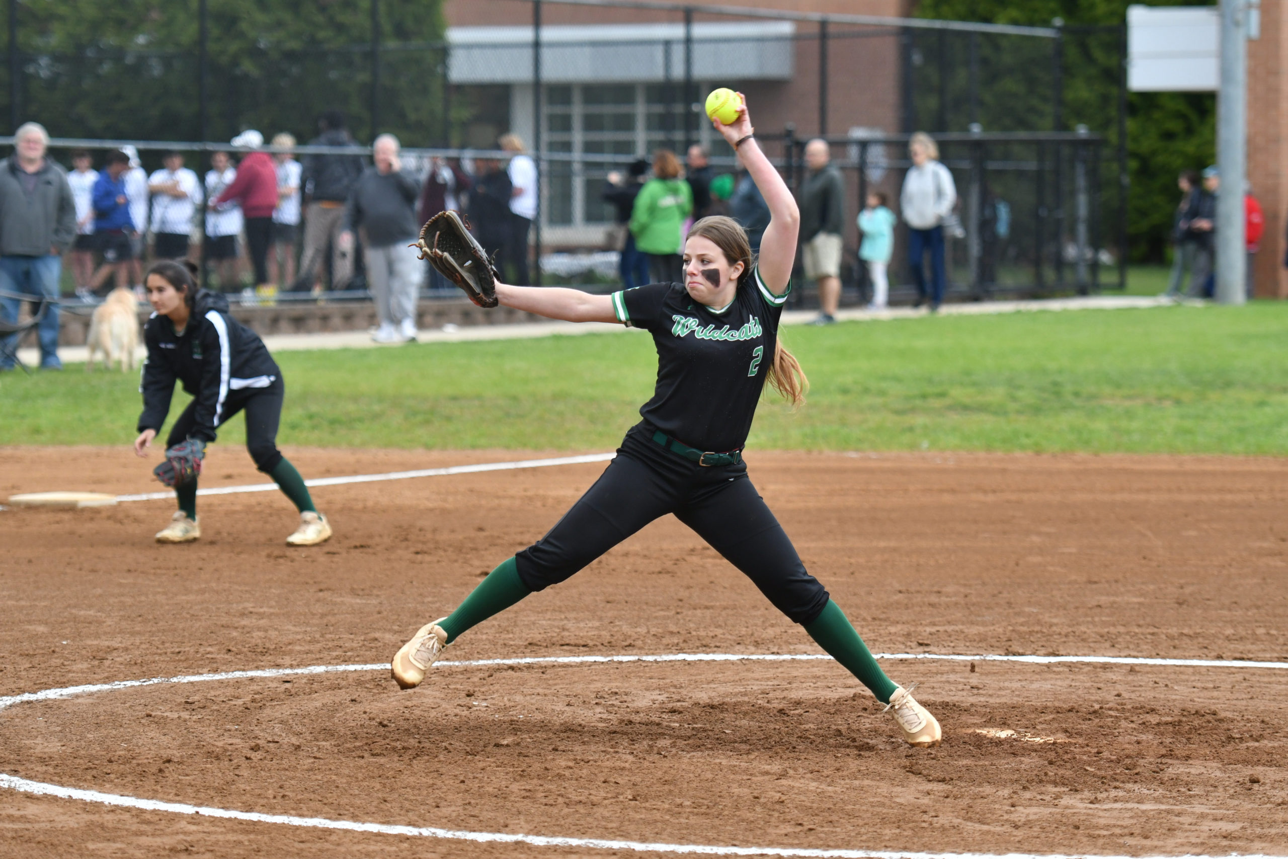 Starting pitcher junior Sami Rosenberg throws a pitch during the teams May 1 senior night game against Watkins Mill. Star pitching from four different pitchers led the team to a 17-0 no-hitter win.