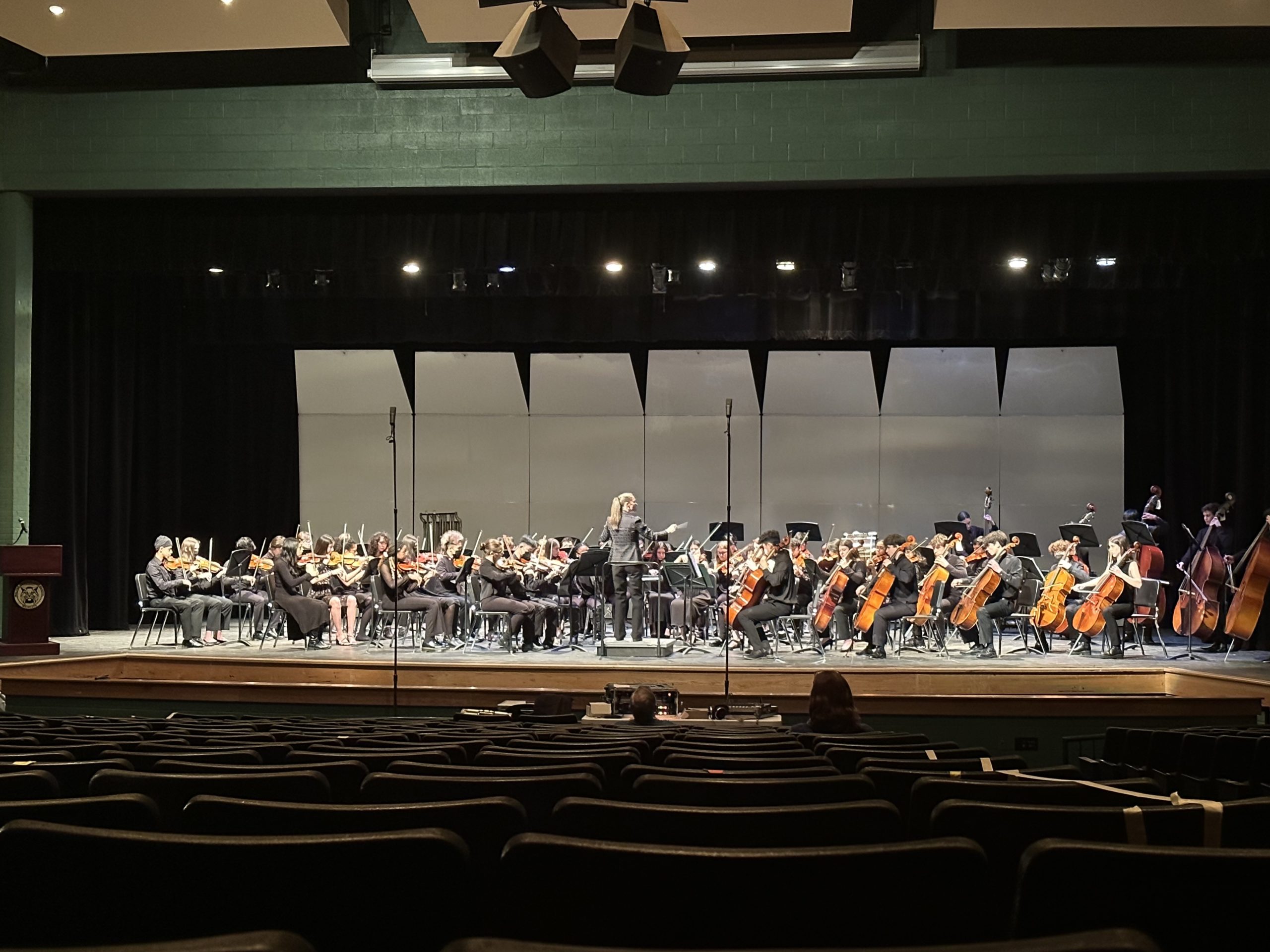 The WJ Concert Orchestra performs under the conduction of Kelly Butler.