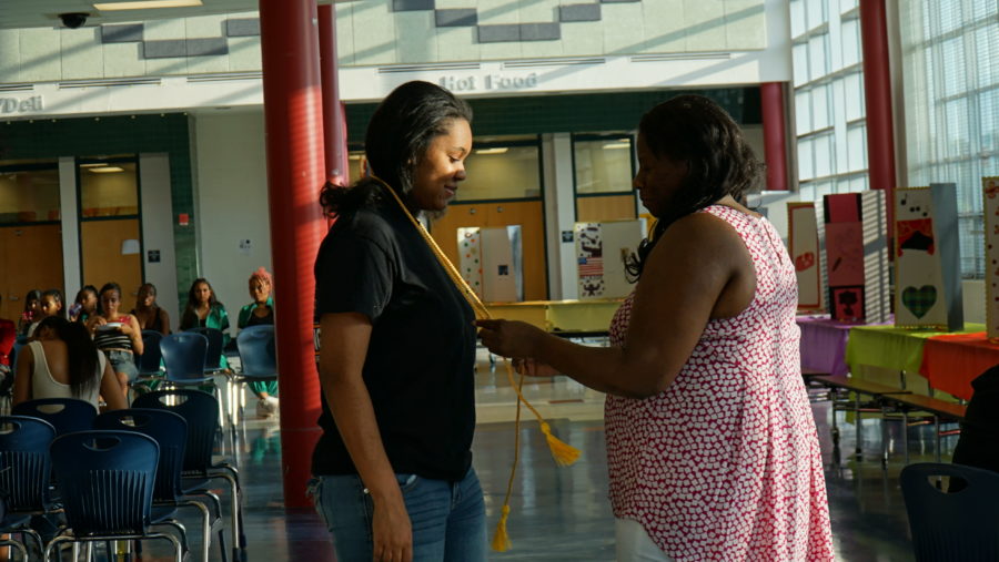 Graduating senior Olivia Profit receives her tassels during the senior ceremony. Profit plans to attend the University of Virginia and major in neuroscience.