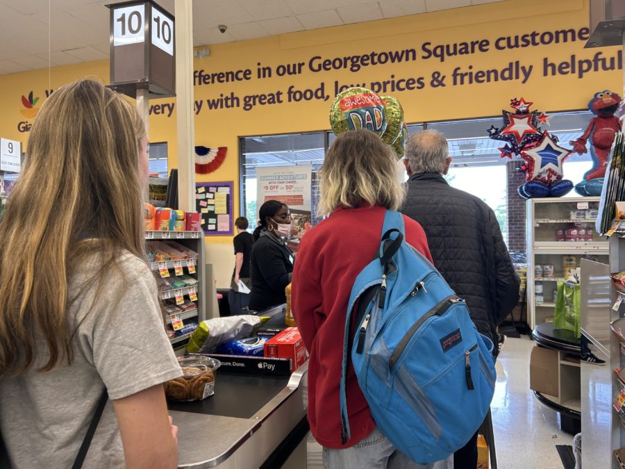Junior+Alex+Koscelnik+waits+in+the+checkout+line+at+Giant+on+Wed.%2C+June+14.+The+Pay-and-Go+system+was+implemented+on+May+5+as+an+attempt+to+limit+unruly+behavior+in+restaurants+and+stores.+Pay-and-Go+is+just+one+of+the+current+policies+that+admin+plans+to+discuss+further+during+the+summer+ILT+meeting.