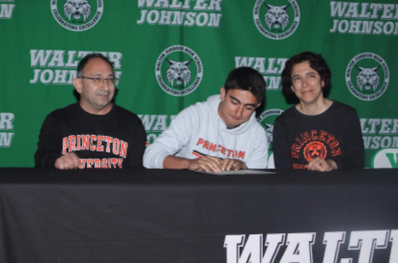 Class of 2023 student Bardia Hormozi participates in a signing day celebration amongst other committed athletes.