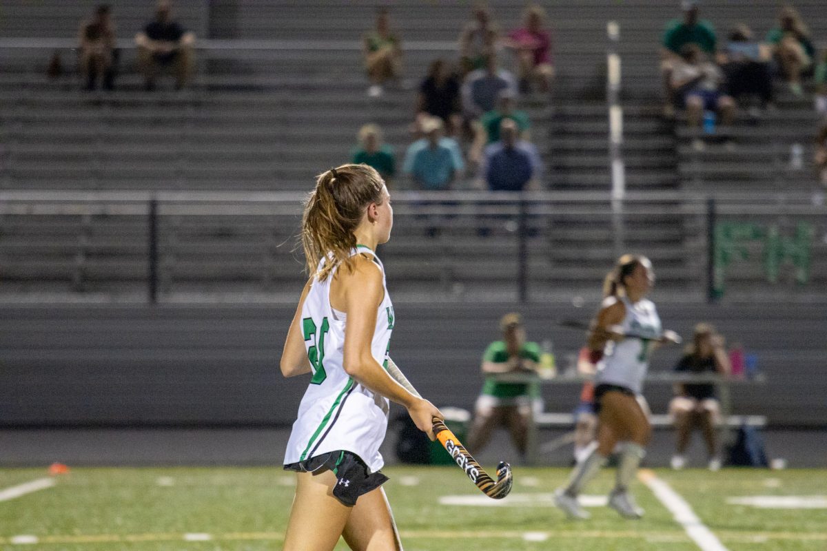 Senior captain Natalya Krouse waits to support her teammate in a play on the field. Krouse moved the ball up the field with ease almost giving them a goal.