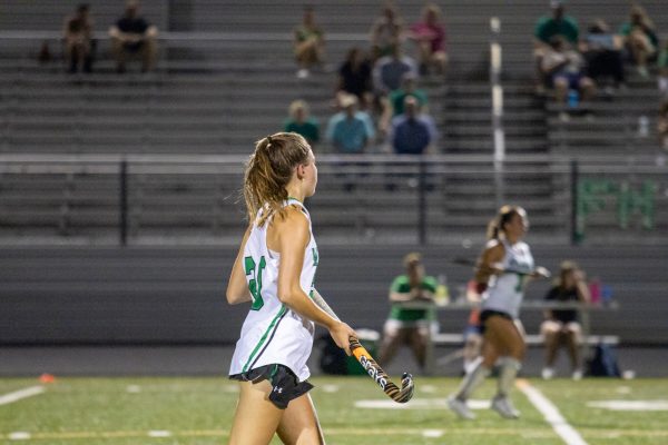 Senior captain Natalya Krouse waits to support her teammate in a play on the field. Krouse moved the ball up the field with ease almost giving them a goal.