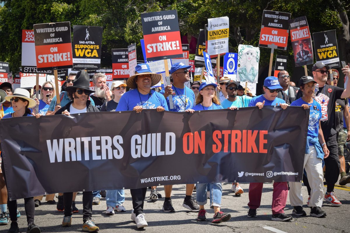 Protesters+crowd+the+streets+in+support+of+the+WGA+strike+against+Hollywood+studios.++This+is+the+eight+time+in+the+guilds+90+year+history+that+they+have+decided+to+go+on+strike.