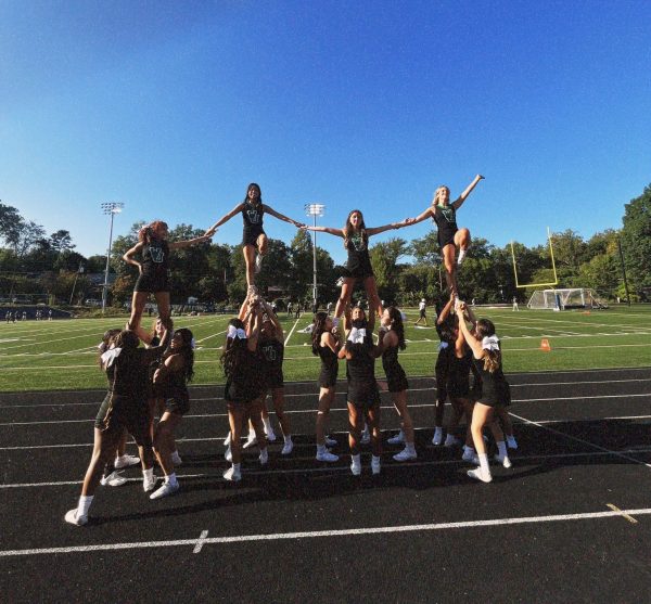 WJ Cheer stunts for the student section on Sept. 1 versus the BCC Barons. They made sure to excite the fans for this big rivalry game.
