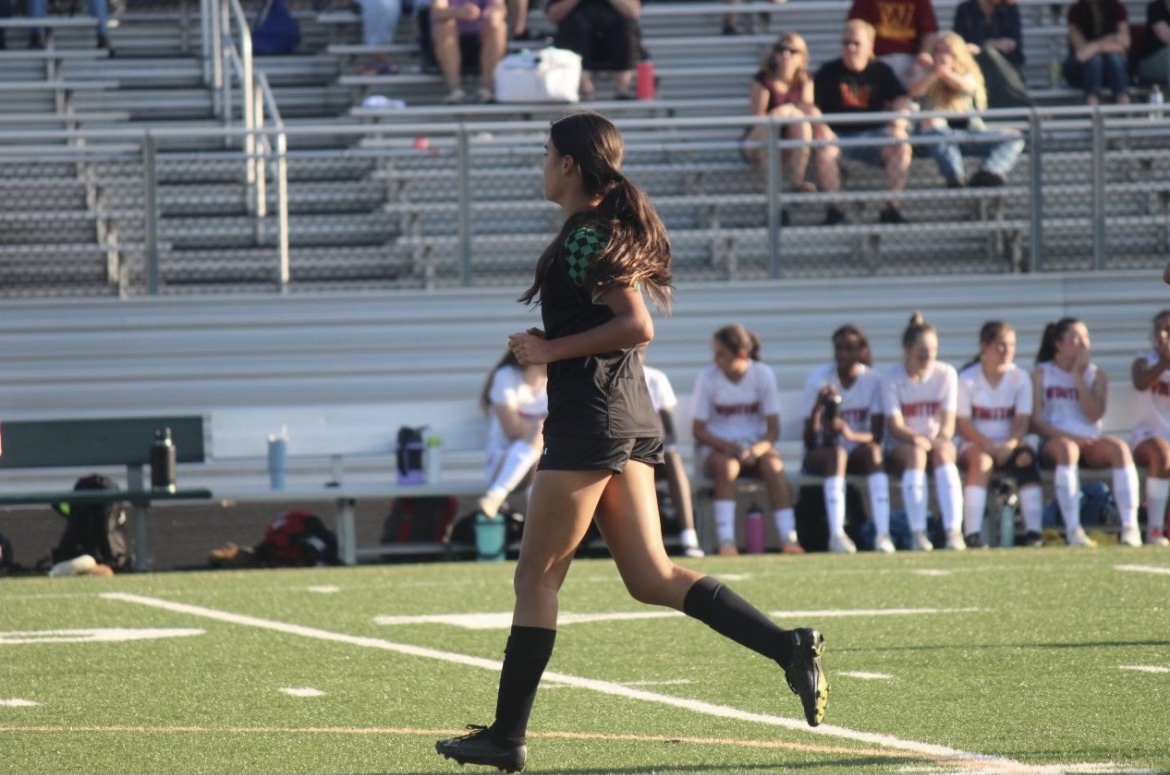 Sophomore Haley Prindle makes a forward run to receive the ball from one of the wingers. The Wildcats were playing the Wootton Patriots in a JV game resulting in a 3-1 win for the Wildcats.