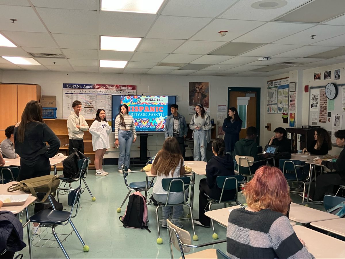 Hispanic Heritage Club leaders present during a joint meeting with the History Club in honor of Hispanic Heritage Month on Friday, October 7.