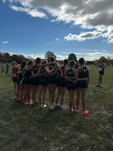 Girls cross country gets ready to launch towards their first place trophy at counties.