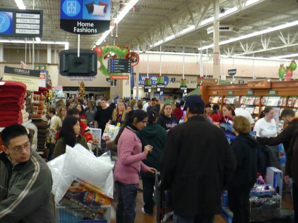 People gathered in Walmart with shopping carts full to the brim on the morning of Black Friday. Black Friday is considered one of the craziest days of the year with the most unlimited deals.