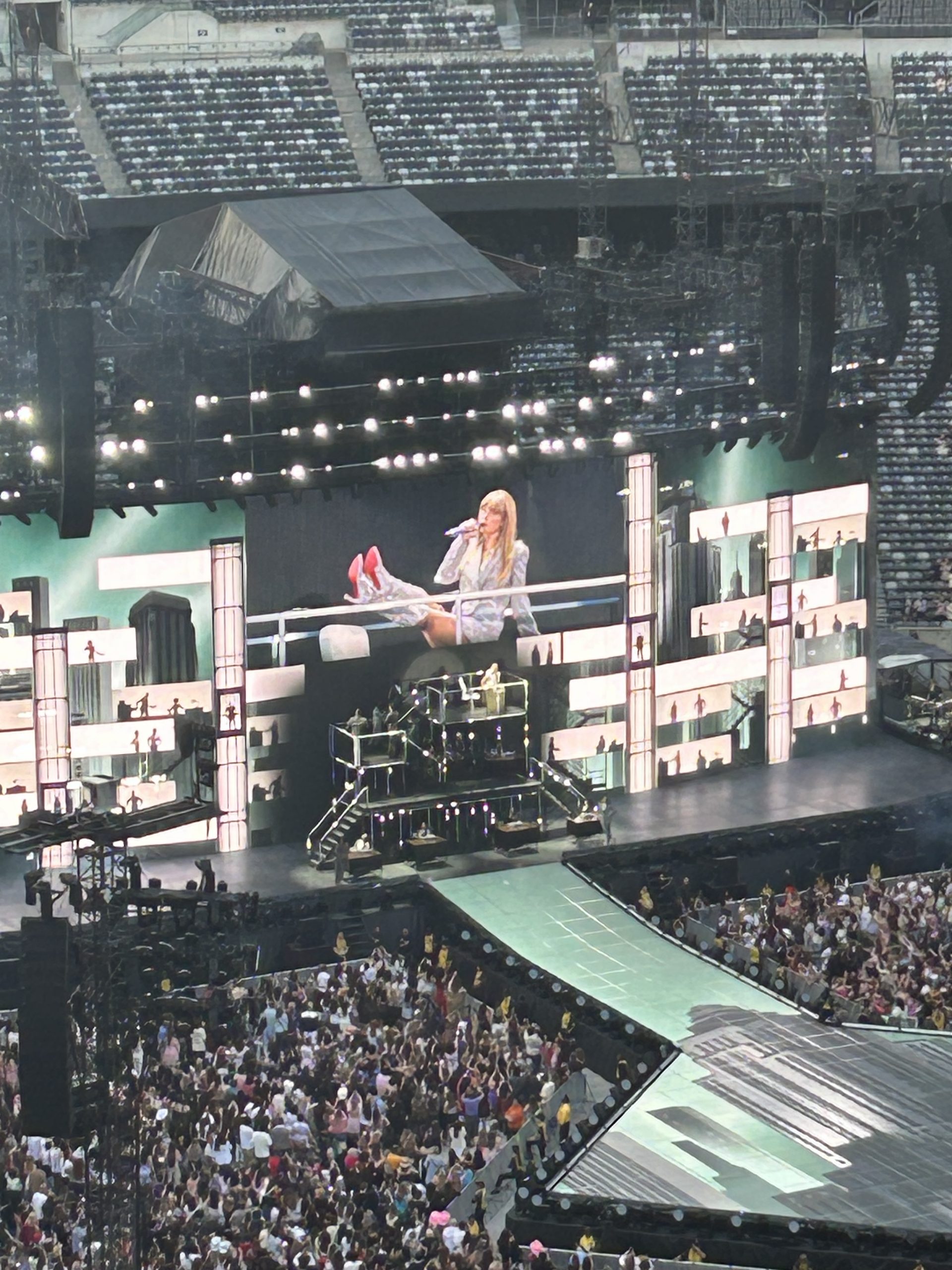 Taylor Swift poses during her concert in Metlife Stadium while singing The Man.  Hopefully, Travis Kelce is The Man for Swift because we love the relationship between the two.