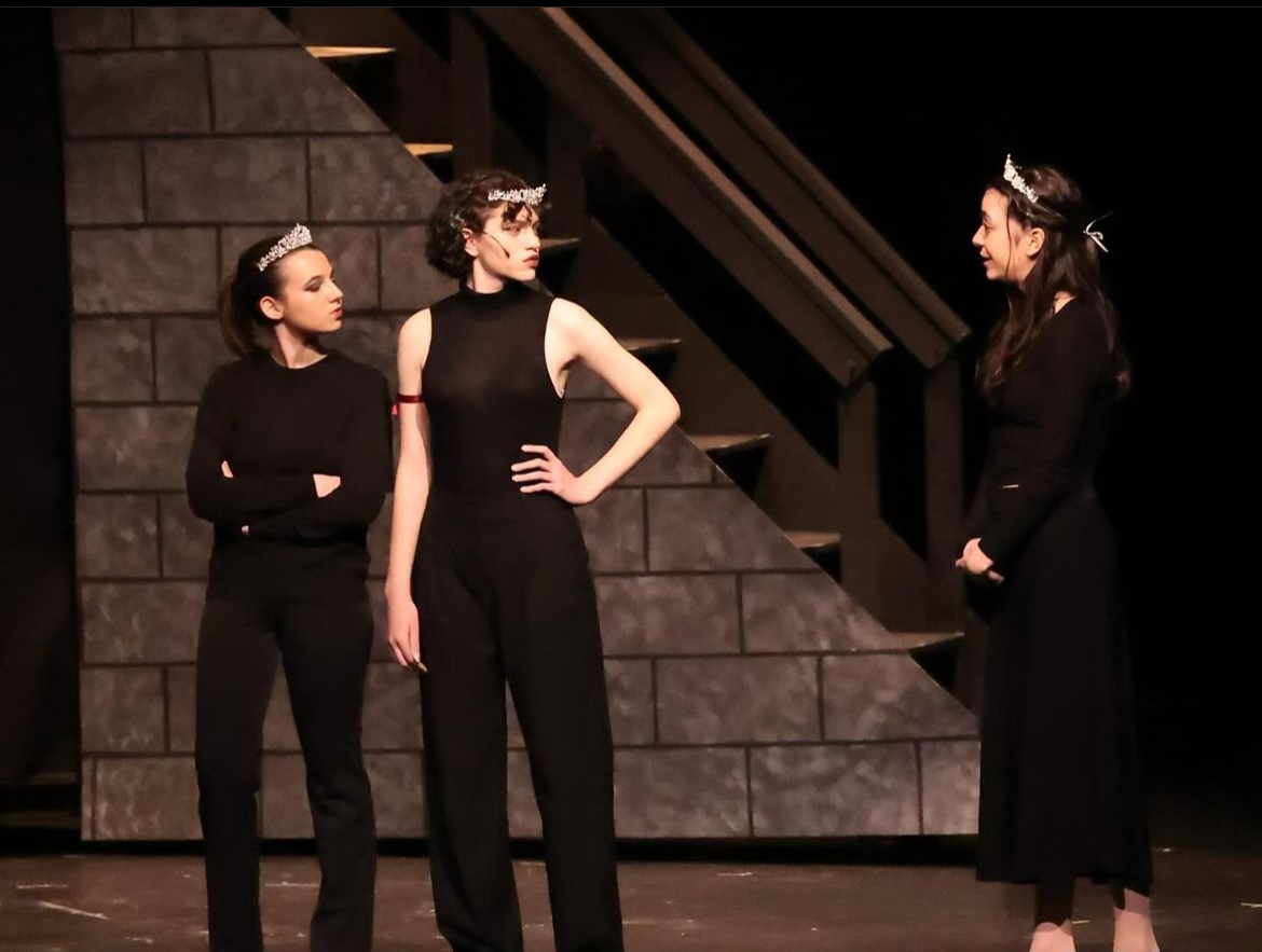 The three daughters of King Lear, Goneril, played by Mia Reid (left), Regan, played by Beatriz Cardoso Lapa (center) and Cordelia, played by Petra Lacayo-Chamorro perform on the second night of King Lear.