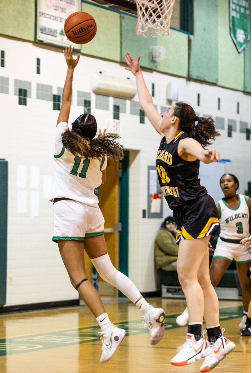 Sophomore Nora Youssef goes for a layup in the Wildcats home opener against the Richard Montgomery Rockets. The Wildcats lost the game 49-37.