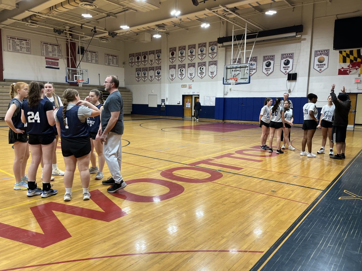 Senior team, the Fireballers, make their gameplan before beginning their game against the Bobcats. The Fireballers just barely beat them ending the game with a score of 19-17.