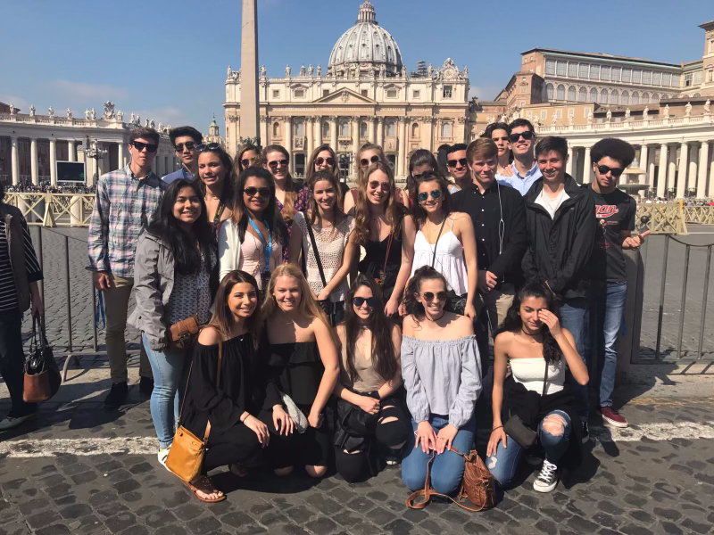 Students+pose+for+a+photo+outside+the+Vatican+during+the+2017+spring+break+trip+to+Switzerland+and+Italy.+Visiting+historic+monuments+and+architecture+was+one+of+the+trips+many+planned+attractions.