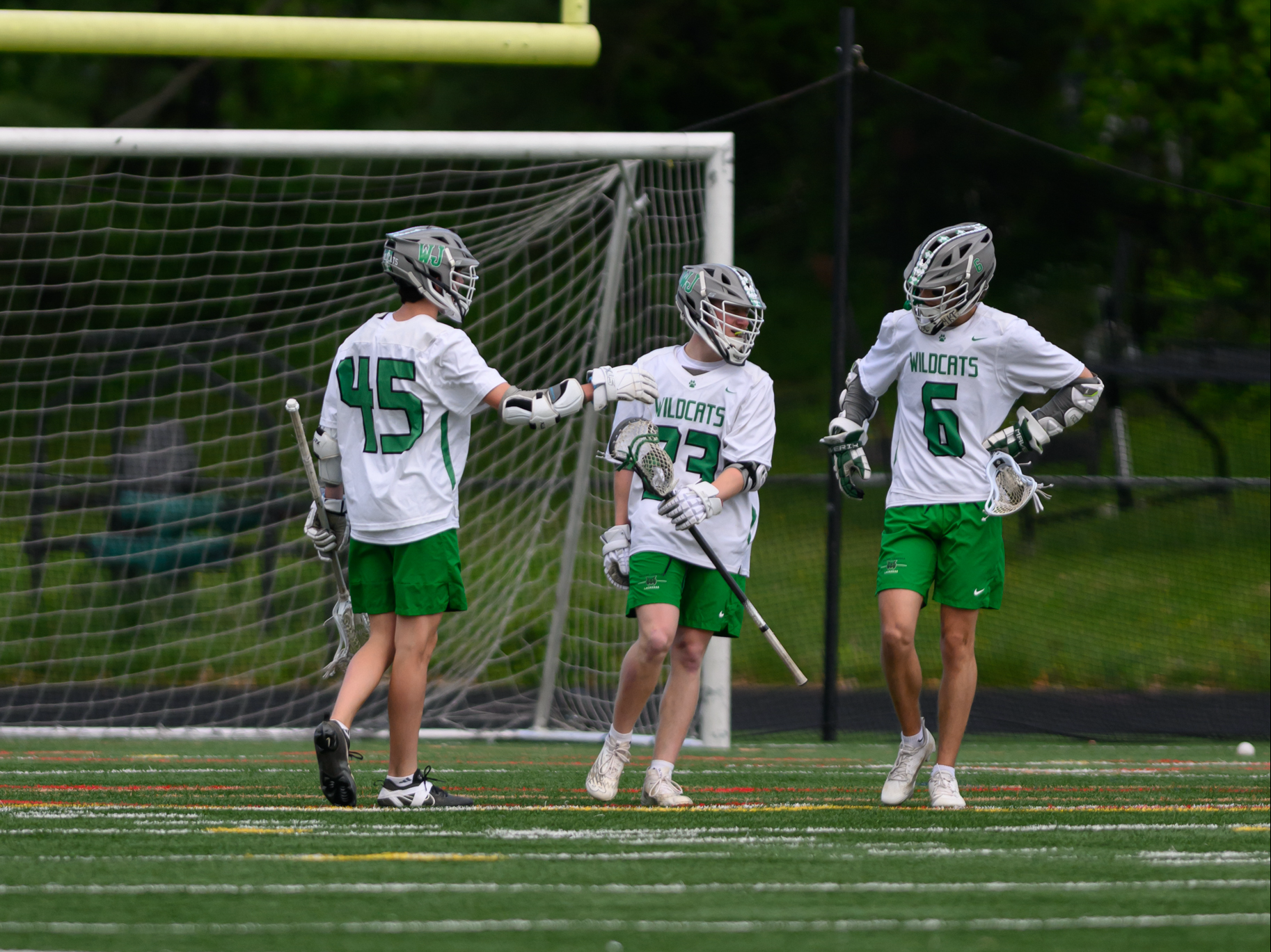 The attacking trio consisting of seniors Jonah Levy and Noah Diamond along with junior Ryan Gardner, celebrate after a WJ goal. (Courtesy Kevin Choi via Lifetouch)
