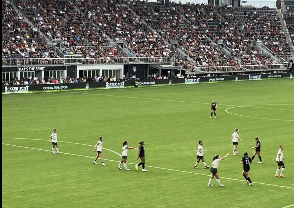 Washington Spirit and Portland Thorns set up a throw in for a chance to score. The Spirit welcomed a new coach and new management this season. (Courtesy Ivanka Weerasinghe)
