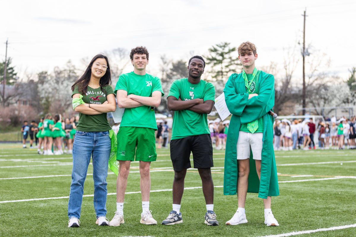 The Walter Johnson SGA poses for a group picture, from left: Michelle Kim, Olin Kimball, Sid Scale and Alex Levy. Each year, the incredible pep rally is planned and run by the SGA.