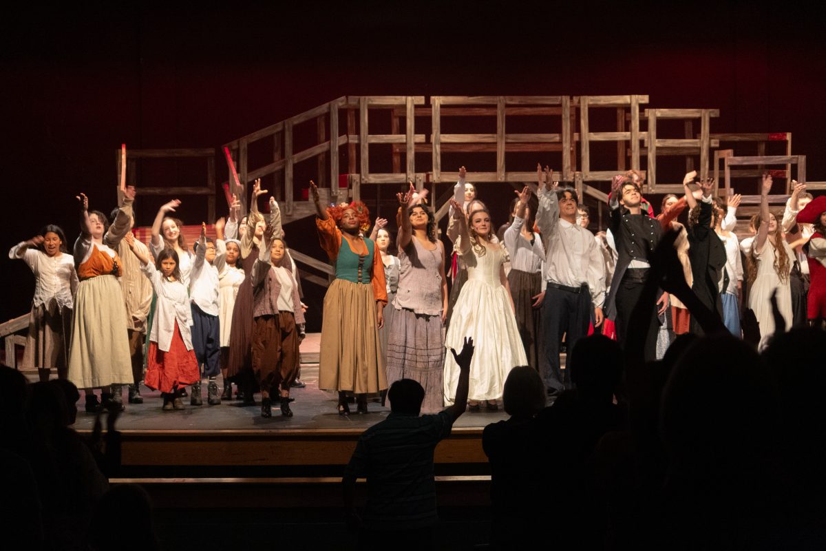The Saturday cast of Les Misérables salutes the audience during the curtain call. Various core cast members from Friday appeared in Saturdays ensemble, and vice versa.