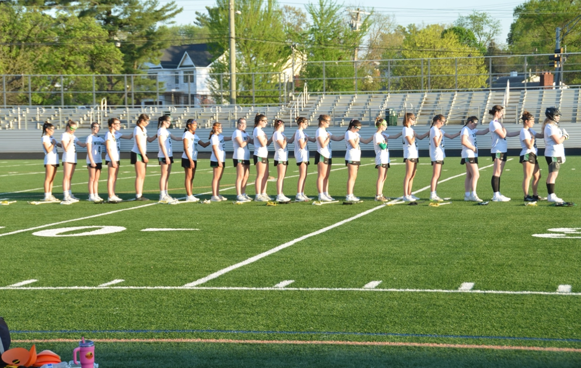 The Wildcats line up for the National Anthem before their game on April 16. The Cats were getting ready to begin their game against the Rockville Rams who they ultimately beat 15-4. 