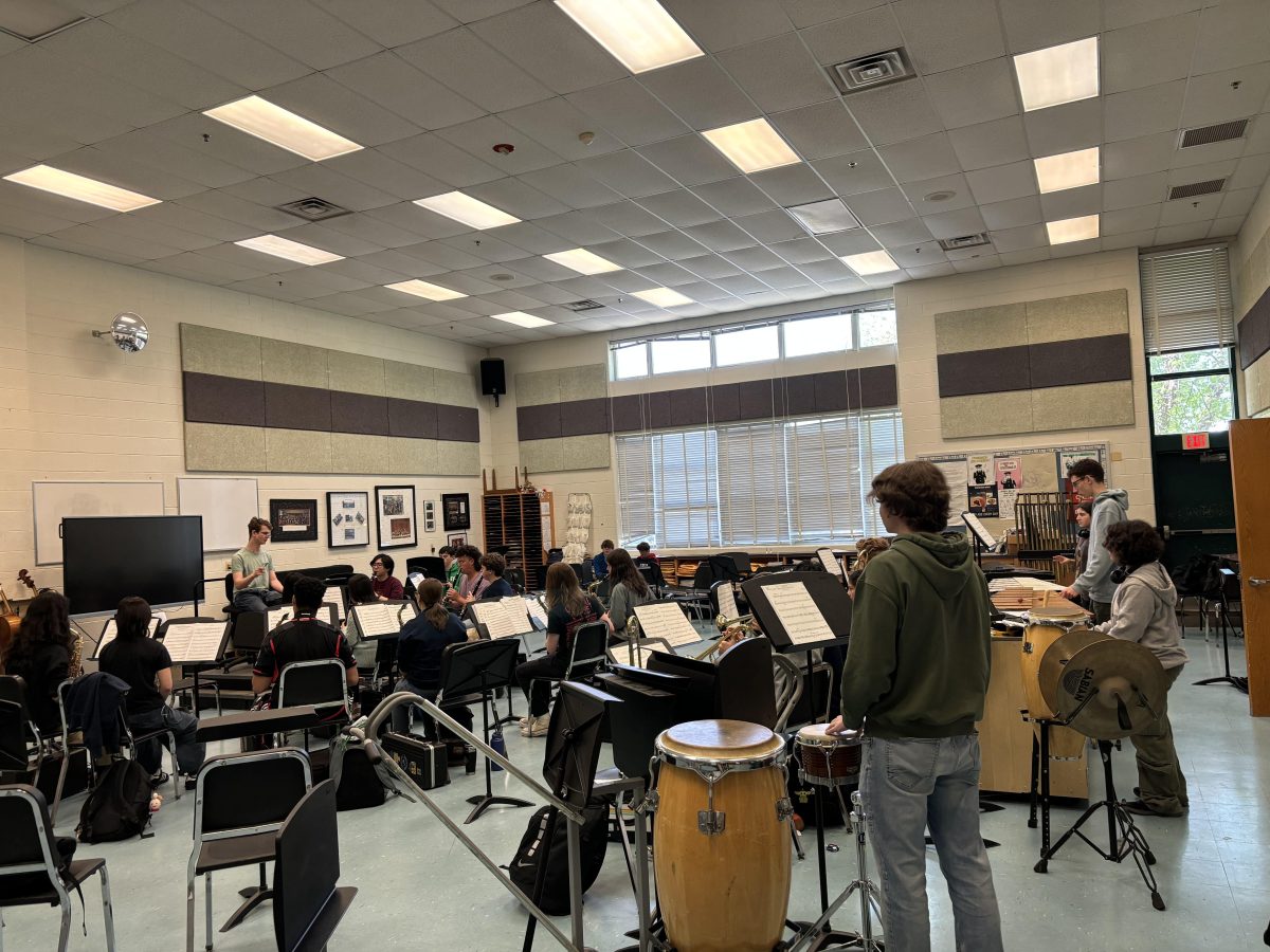 The band class practices a song in seventh period. Arts classes like music offer avenues for students to explore their creativity and help them improve collaboration and motor skills.
